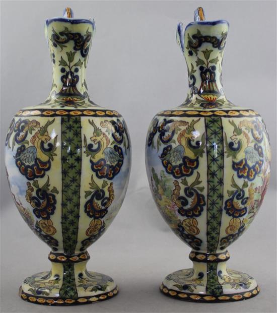 A pair of French faience ewers, late 19th / early 20th century 30cm